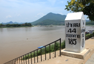 The mile marker at Kaeng Khut Khu shows you sea level (0), and some other unexplained measurements.