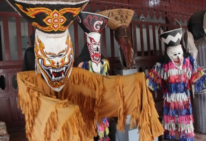 Dan Sai's ubiquitous Phi Ta Kon mask and costume (outside the Phi Ta Kon Museum)